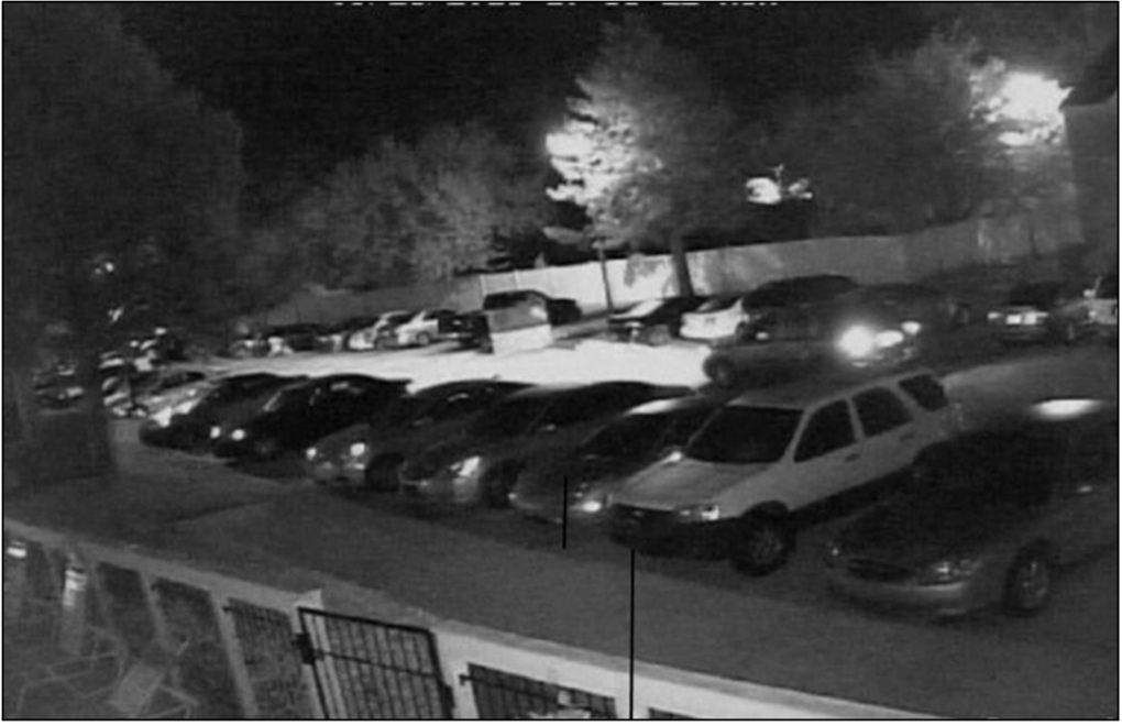surveillance footage of a parking lot