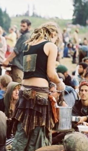 backside of woman with dreads at a festival
