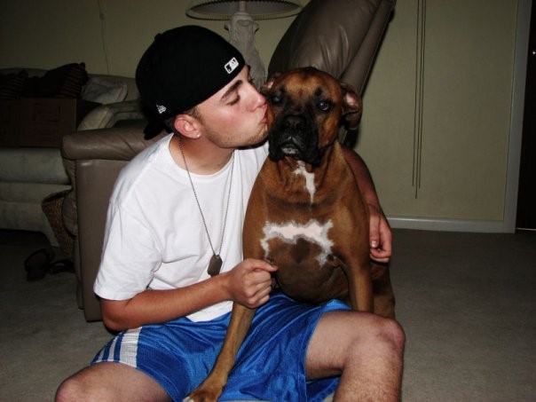 Kyle with family dog, Jax.