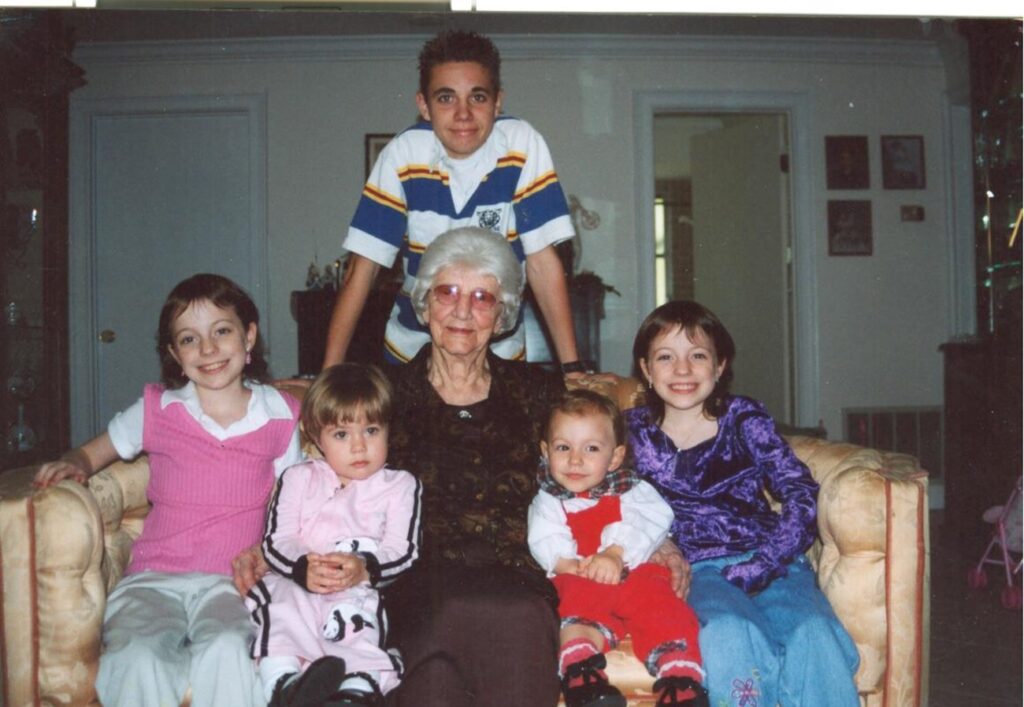 Young Kyle (center) with his great grandmother and cousins. Courtesy: Lynne Kreger