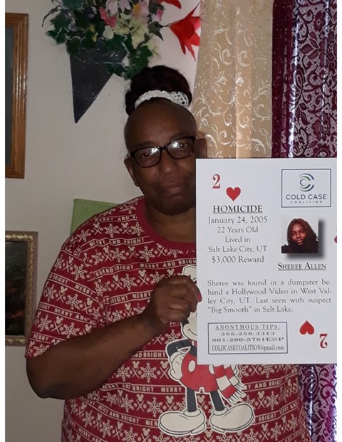 Lillie Allen poses with daughter Sheree’s cold case playing card.