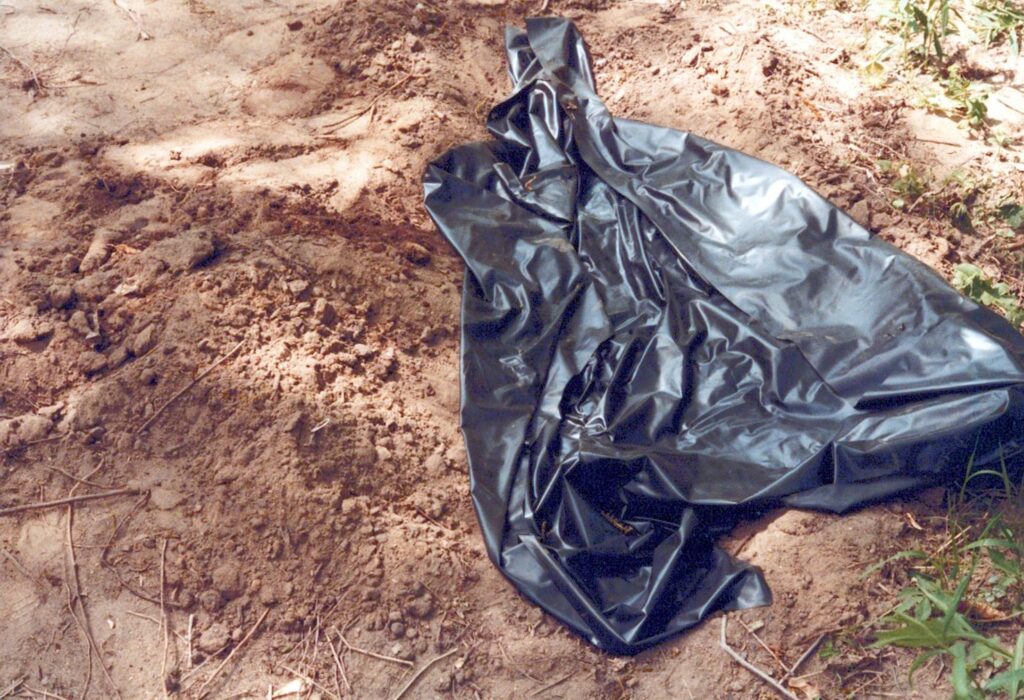 A crime scene photo of Linda’s burial site.