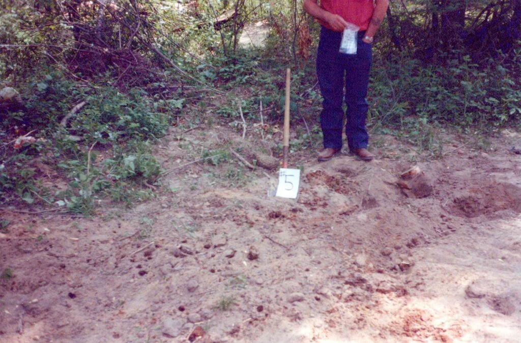 A crime scene photo of Linda’s burial site.