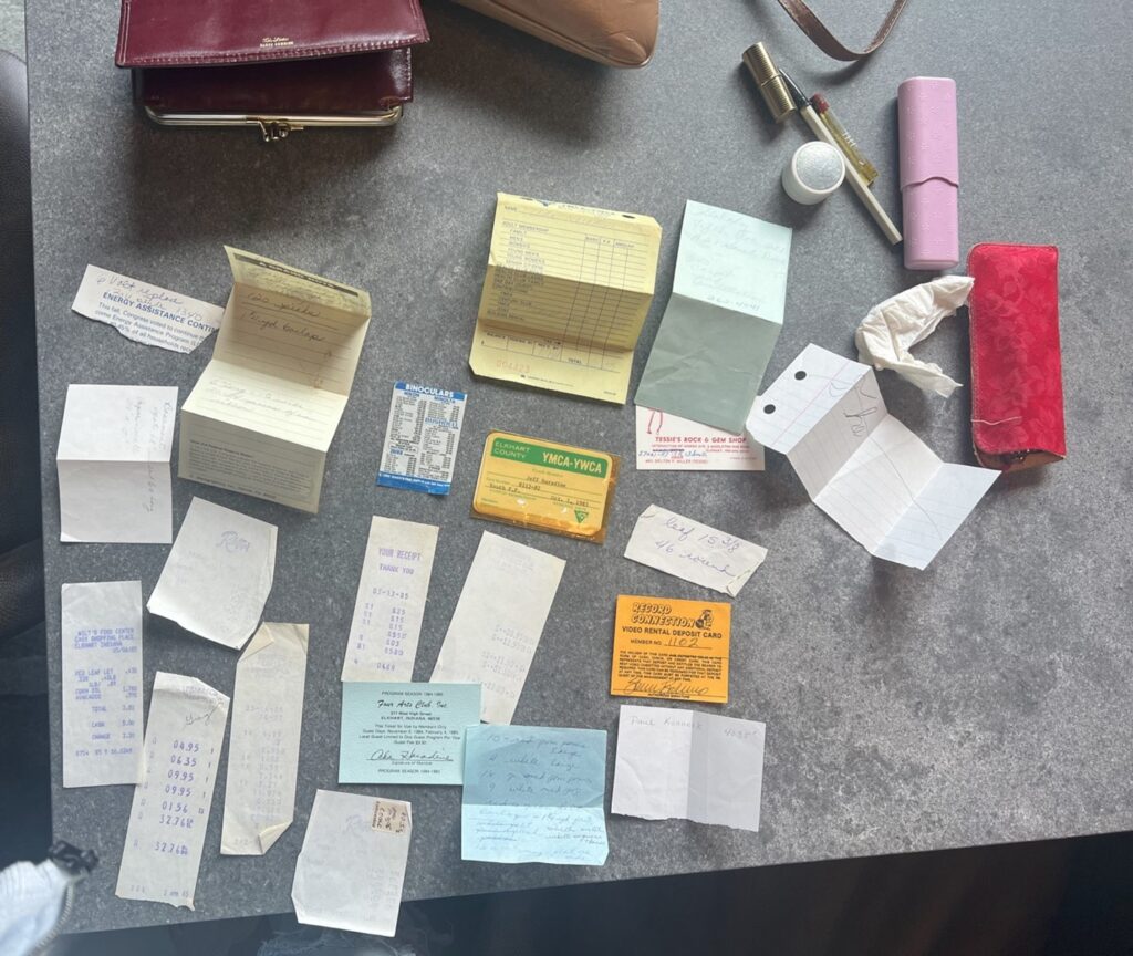 Papers and receipts found in Ada's wallet, which was in her purse on her dresser; items provided by family.