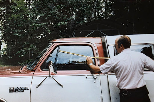 Investigators analyzing George’s truck after his murder.