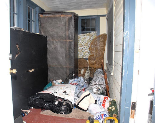 An evidence photo of the enclosed porch at 193-195 Leighton Ave.