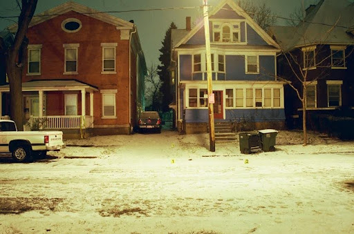 Original crime scene photos of the driveway and neighborhood where Roger McCall was shot and killed back in 2003.