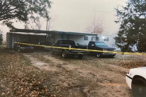 Original crime scene photos from 2002 of Robert’s mobile home where he was shot and killed.
