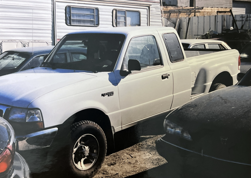Photographs of Jeff’s truck in an impound lot.