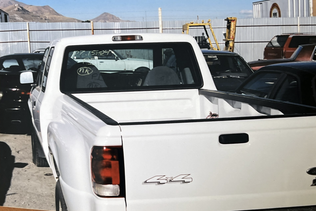 Photographs of Jeff’s truck in an impound lot.