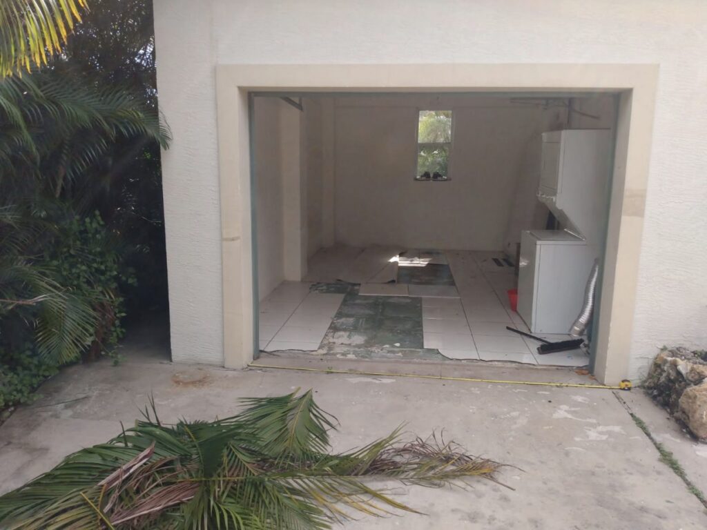Daniel’s House with missing garage door. Courtesy: David Traina